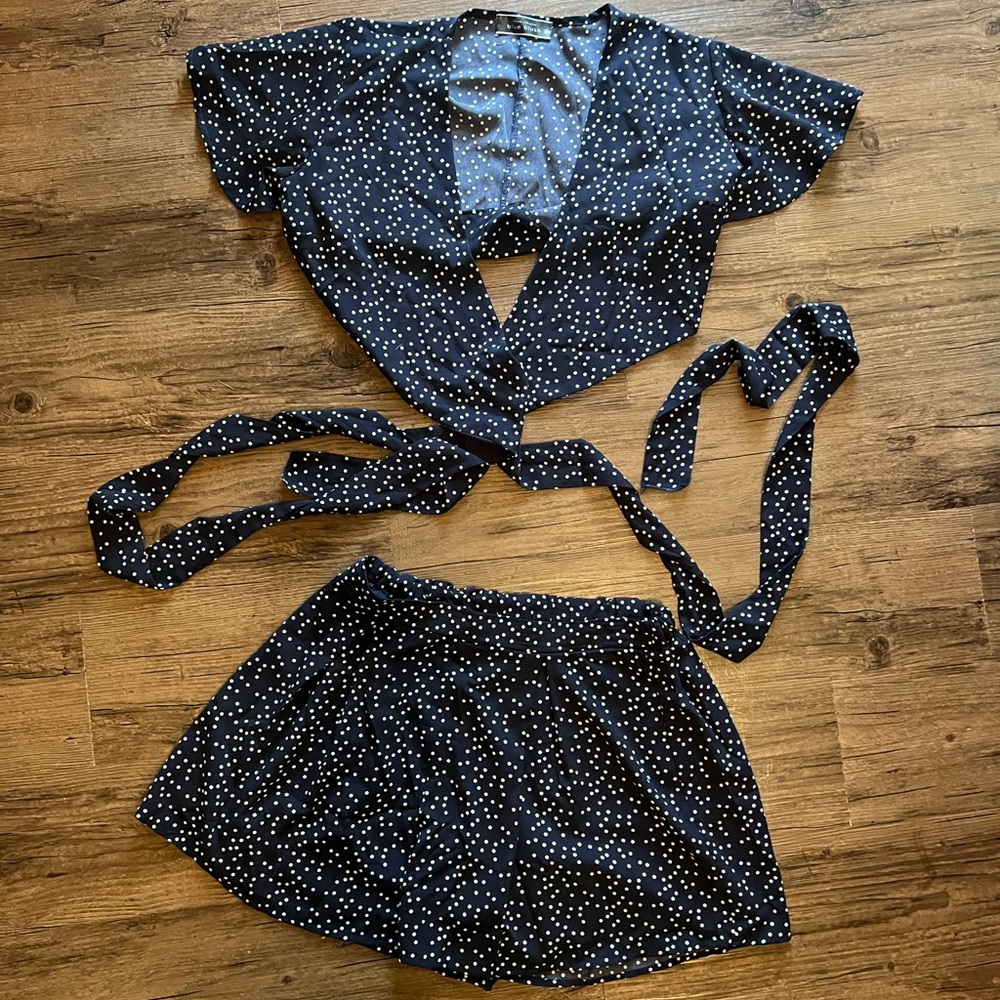matching set with tie front/back top and pleated shorts with elastic waistband